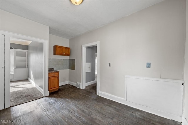 interior space with dark wood-type flooring