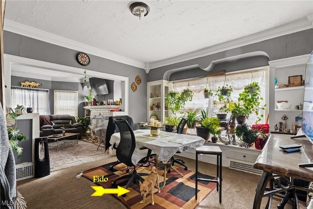 office space featuring ornamental molding, carpet flooring, a brick fireplace, and a textured ceiling