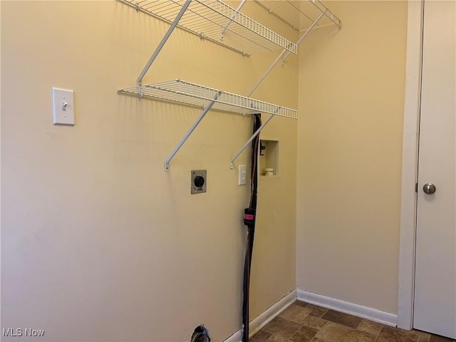 clothes washing area featuring electric dryer hookup and washer hookup