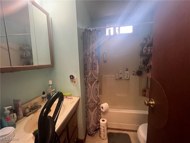 bathroom with toilet and shower / bath combo