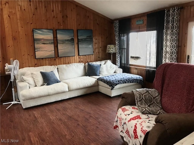 living room with vaulted ceiling, dark hardwood / wood-style floors, and wooden walls