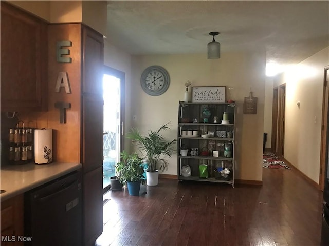 hallway with dark wood-type flooring