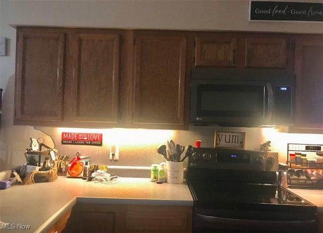 kitchen featuring black appliances