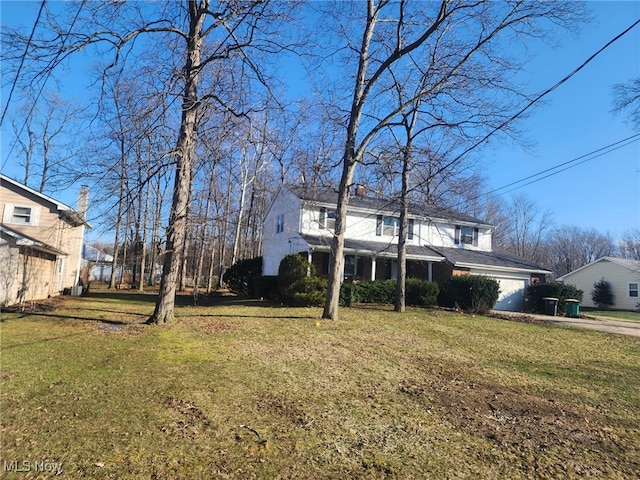 view of home's exterior with a lawn