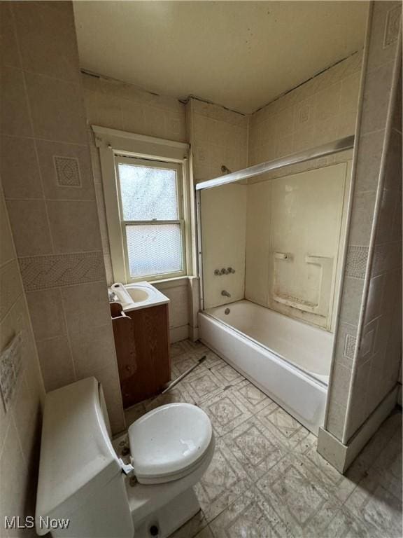 full bathroom featuring vanity, shower / tub combination, and toilet