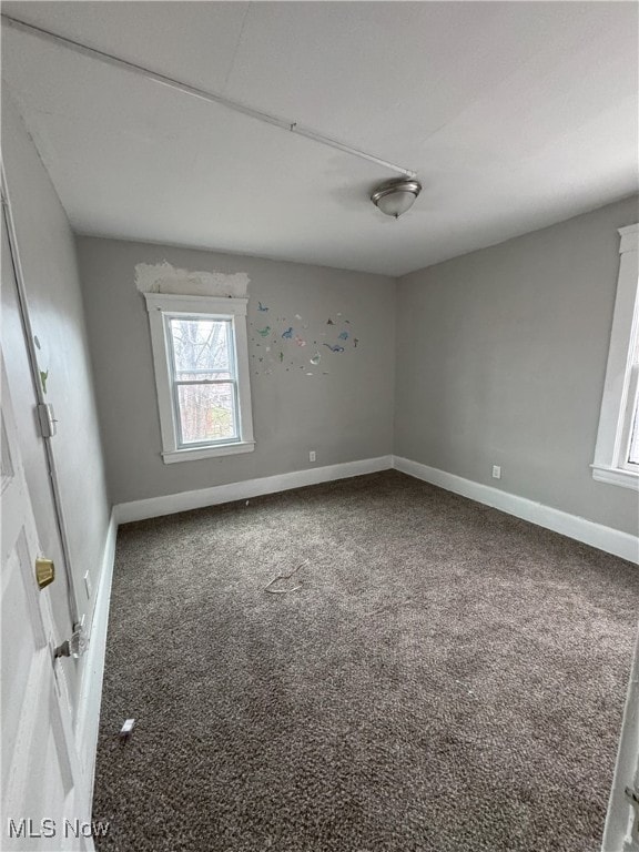 empty room with carpet floors