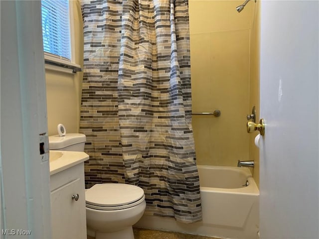 full bathroom with vanity, toilet, and shower / tub combo with curtain