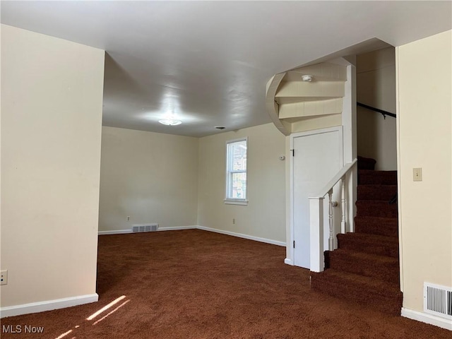 interior space with dark carpet