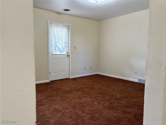 interior space with dark carpet