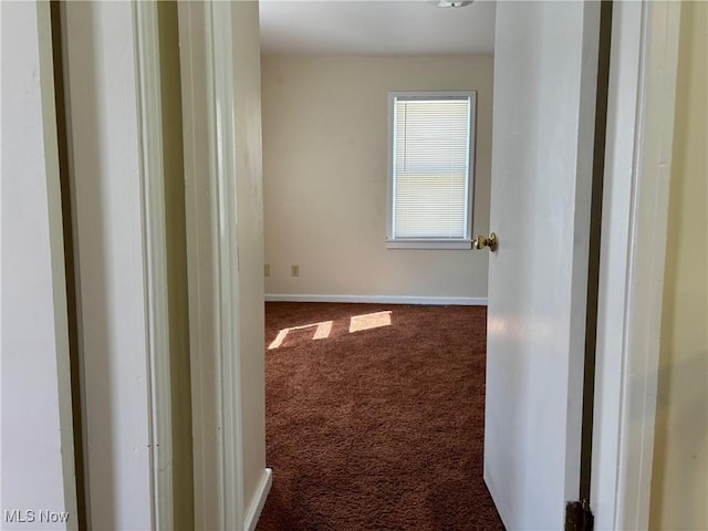 hall with carpet flooring