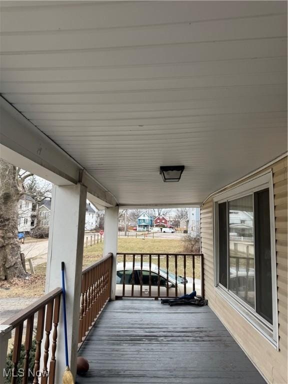 wooden terrace with covered porch