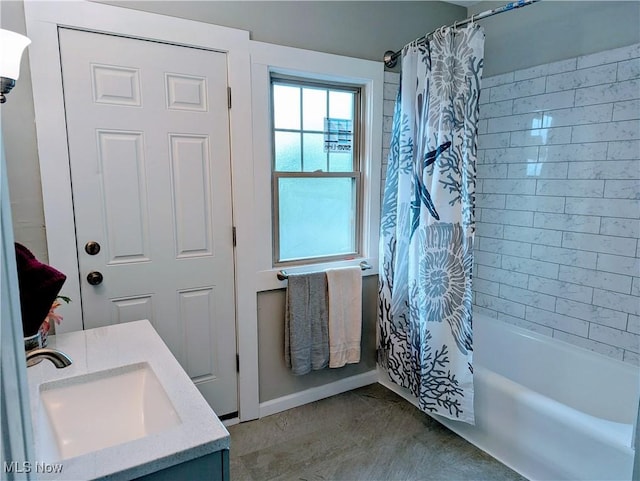 bathroom with vanity and shower / bath combination with curtain