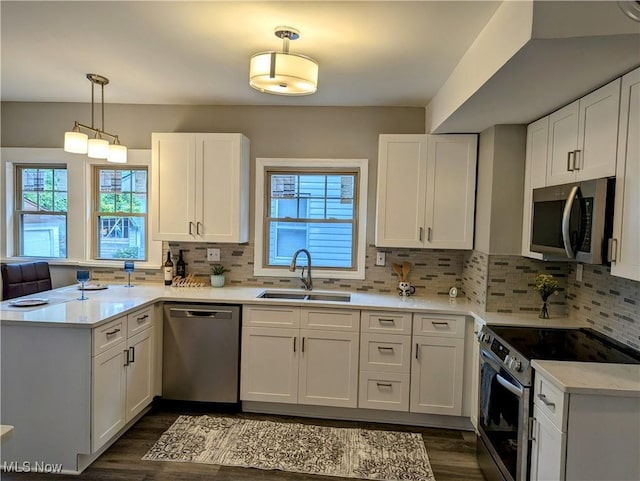 kitchen with stainless steel appliances and white cabinets