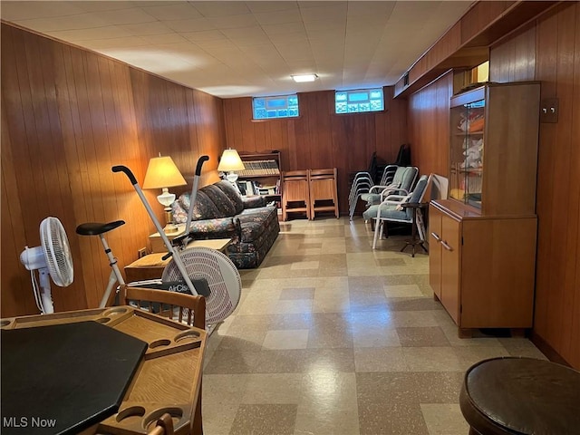 interior space featuring wooden walls