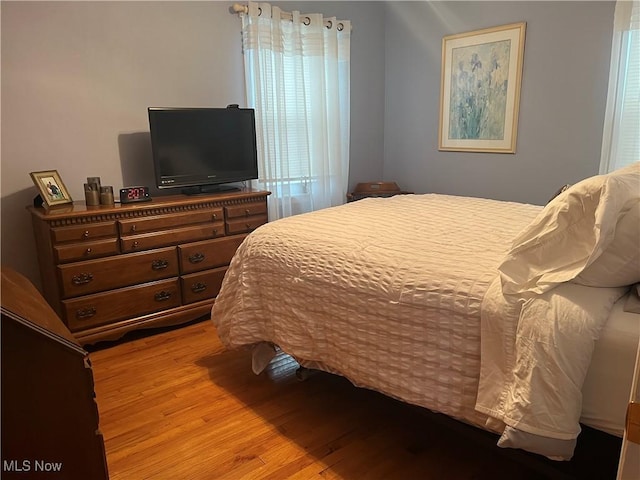 bedroom featuring light hardwood / wood-style floors