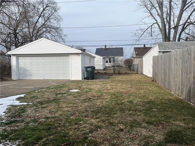 view of yard with a garage and an outdoor structure