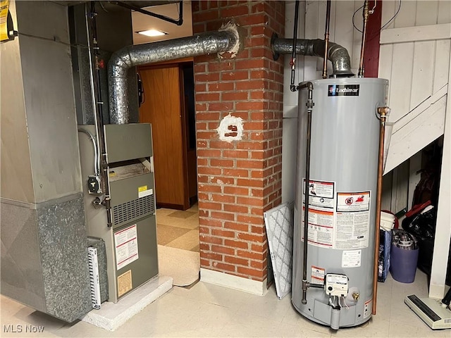 utility room with heating unit and gas water heater