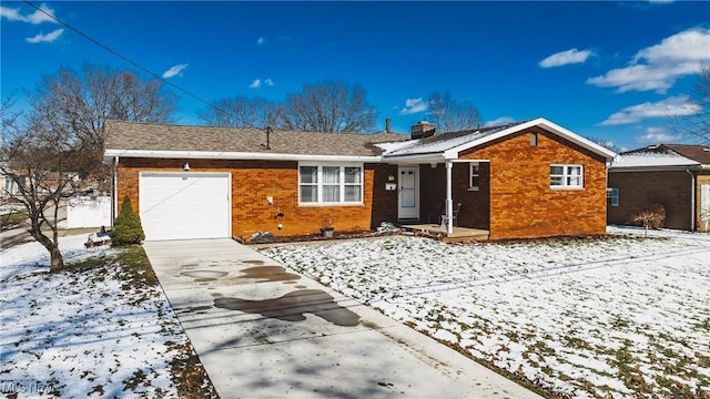 ranch-style house featuring a garage