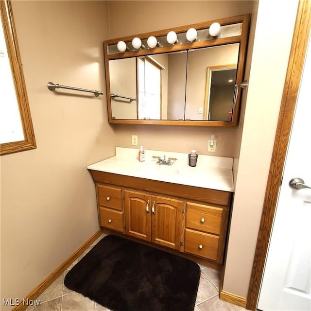 bathroom featuring vanity and tile patterned floors