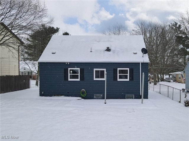 view of snow covered property