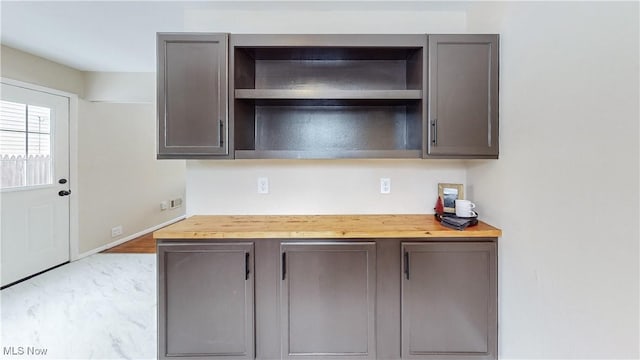 kitchen featuring wooden counters