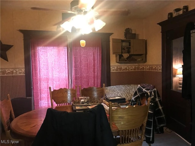 dining room featuring ceiling fan