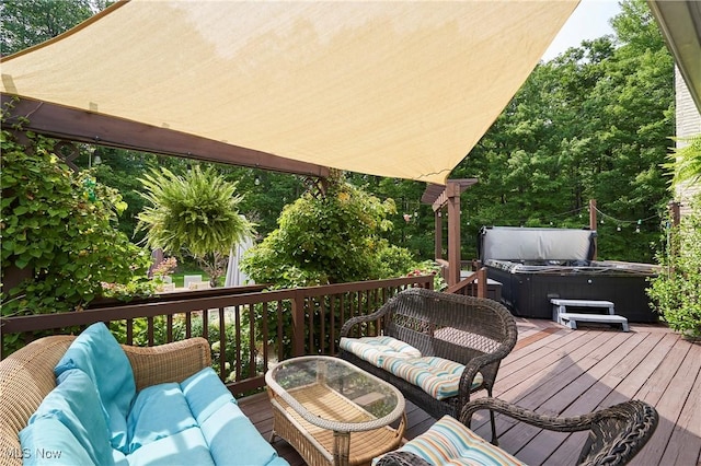 wooden deck featuring a hot tub