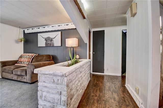 living room with dark hardwood / wood-style flooring