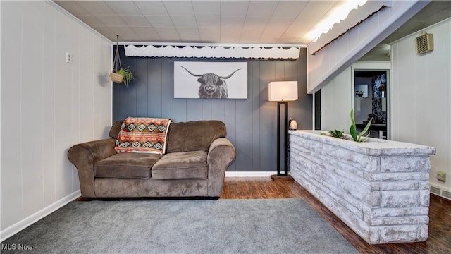 living area with dark wood-type flooring