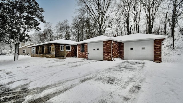 single story home featuring a garage