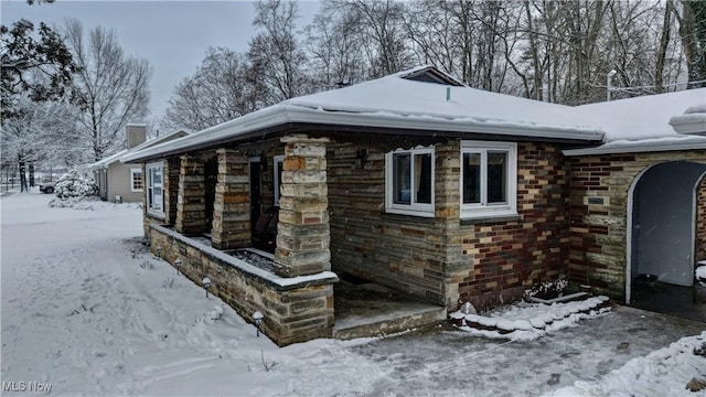 view of snow covered property