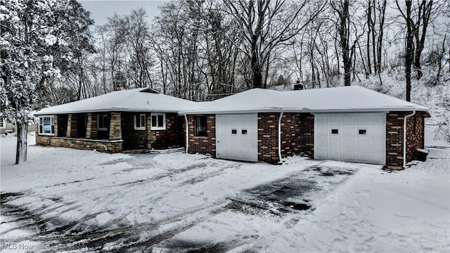 single story home featuring a garage