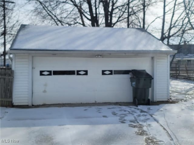 view of snow covered garage