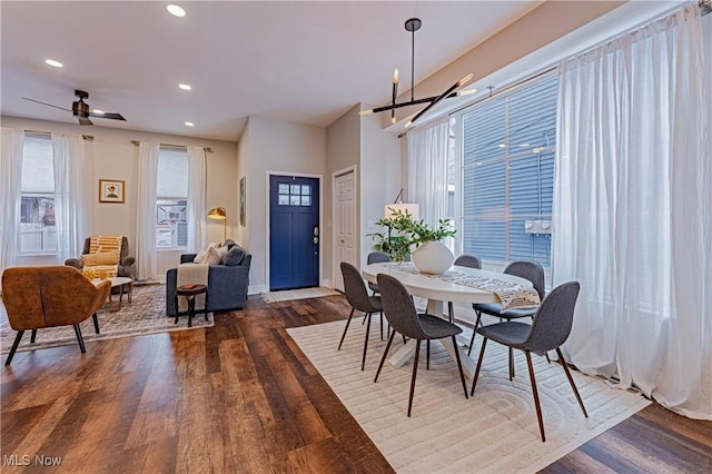 dining room featuring ceiling fan and dark hardwood / wood-style floors