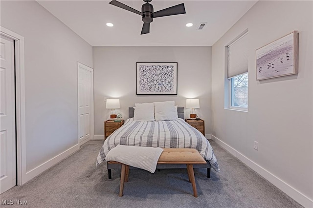 carpeted bedroom featuring ceiling fan