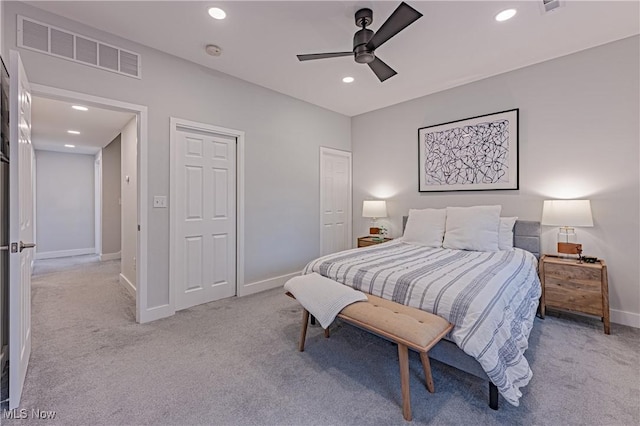 carpeted bedroom featuring ceiling fan