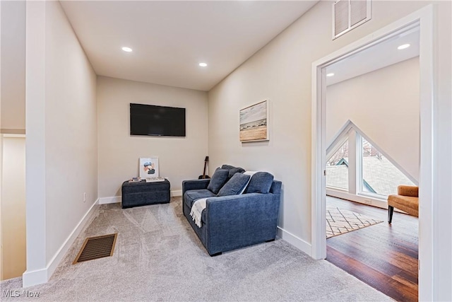 living area with carpet flooring