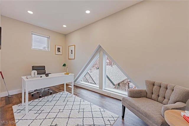 home office with hardwood / wood-style floors