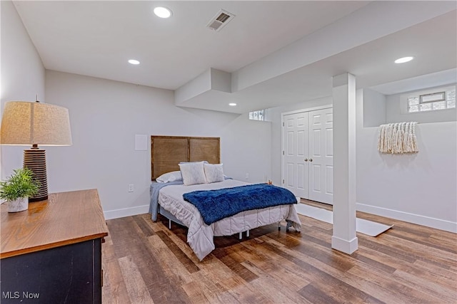 bedroom featuring hardwood / wood-style flooring