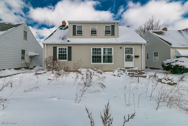 view of snow covered property