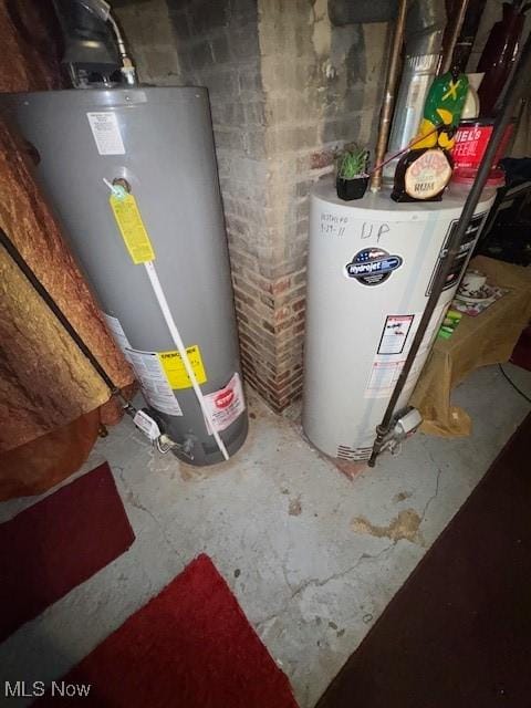 891-893 Stadelman Ave, Akron, OH 44320 - utility room featuring gas water heater