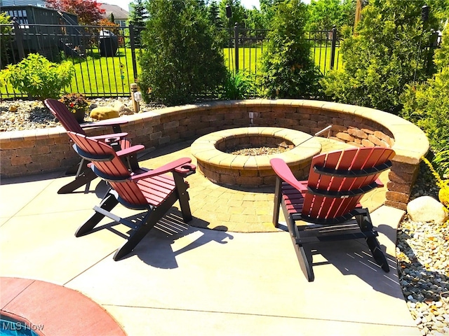 view of patio with an outdoor fire pit