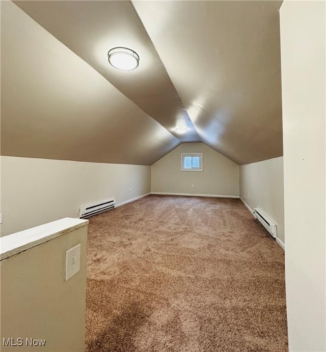 bonus room featuring carpet floors, lofted ceiling, and baseboard heating