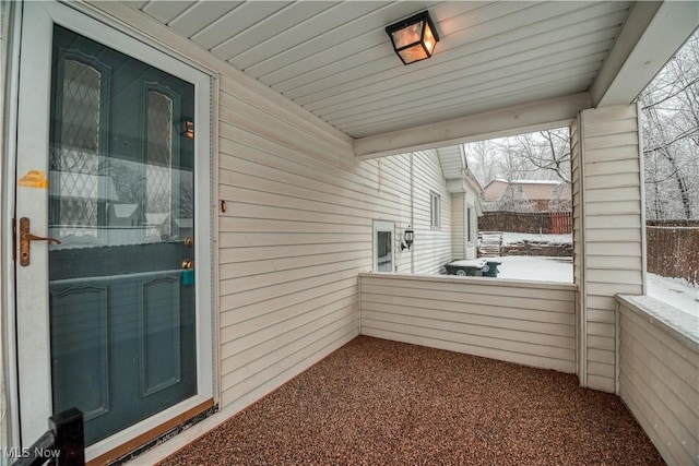 view of snow covered patio