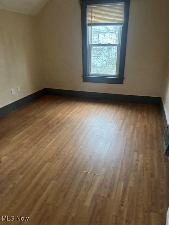549 Hazel Pl, Akron, OH 44304 - additional living space featuring hardwood / wood-style flooring and lofted ceiling