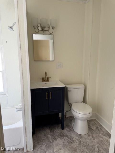 bathroom with toilet and vanity