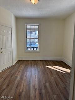 interior space with dark hardwood / wood-style floors