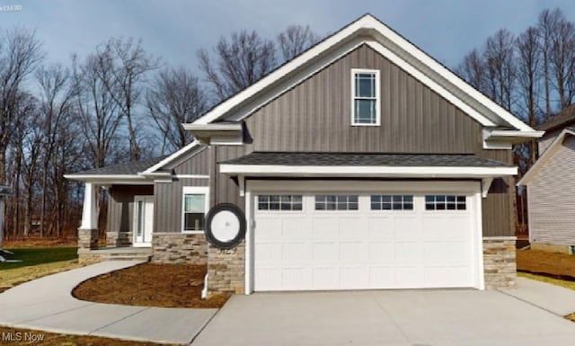 craftsman house with a garage