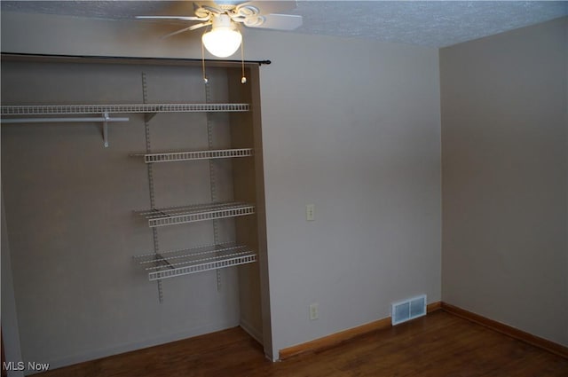 closet featuring visible vents