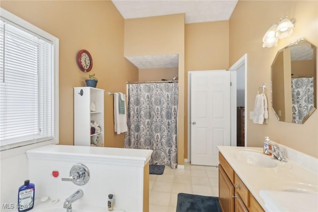 bathroom featuring vanity and shower with separate bathtub